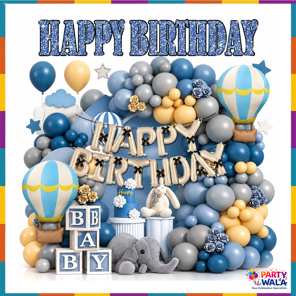 Sky-theme Happy Birthday party setup with two hot air balloon foils, cream Happy Birthday foil letters, blue grey and gold balloon garland