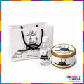 Black and white Kaaba Umrah Tabarruk gift set with white bag matching bottle and 250g gold lid tin