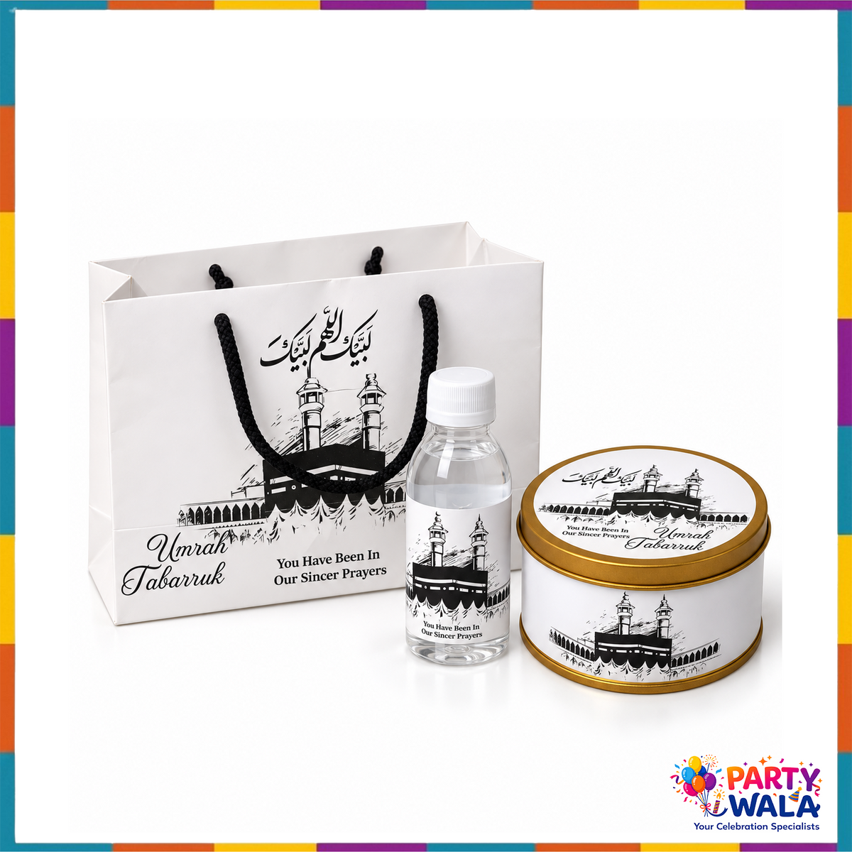 Black and white Kaaba Umrah Tabarruk gift set with white bag matching bottle and 250g gold lid tin