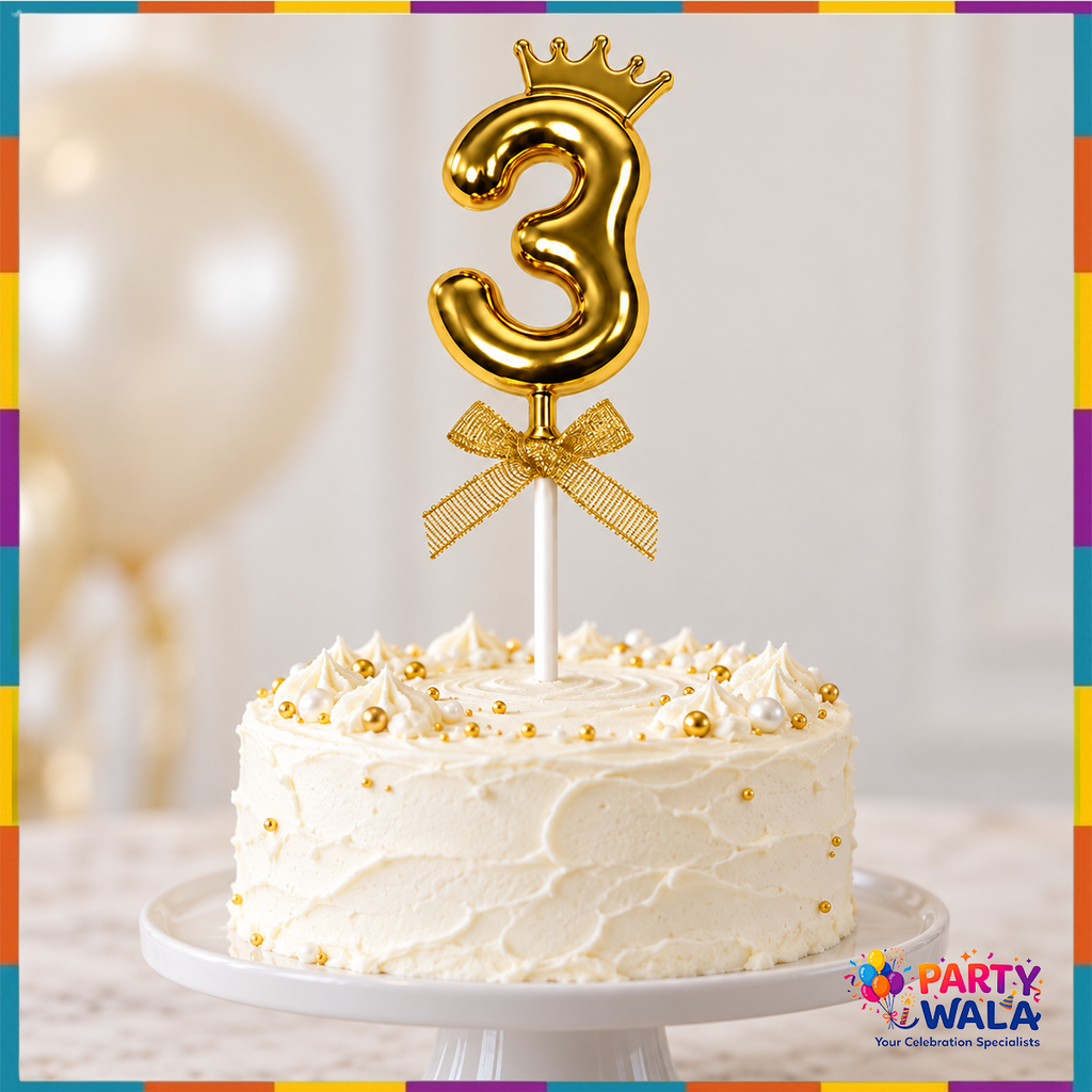 Gold crown number 3 cake topper with bow displayed on a white birthday cake
