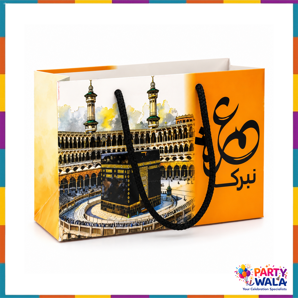 Orange and cream Umrah Mubarak paper gift bag with Kaaba artwork