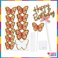 Gold Happy Birthday topper with pink bow and separate pink butterfly decorations