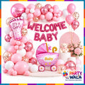 Welcome Baby Girl pink balloon decoration setup with baby carriage foil balloon